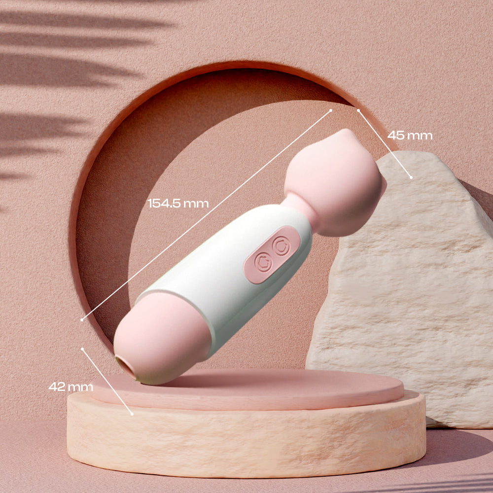 Pink and white Sakura Purr wand resting on a round wooden display block