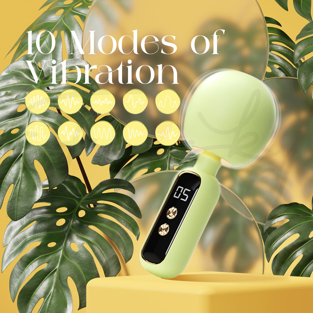 Pastel green Élora Mini AV Vibrator surrounded by lush leaves and natural tones.