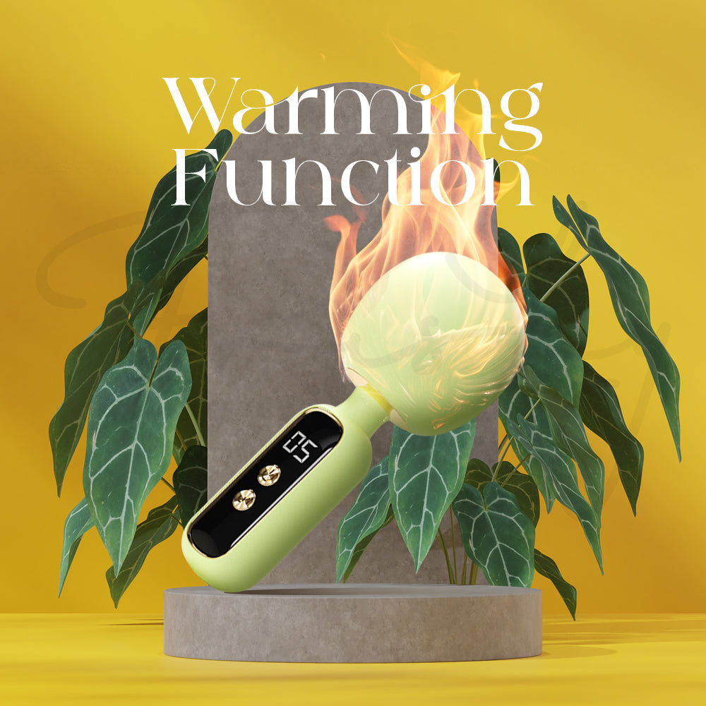 Warm-toned photo of Élora Mini AV Vibrator glowing softly in golden light.