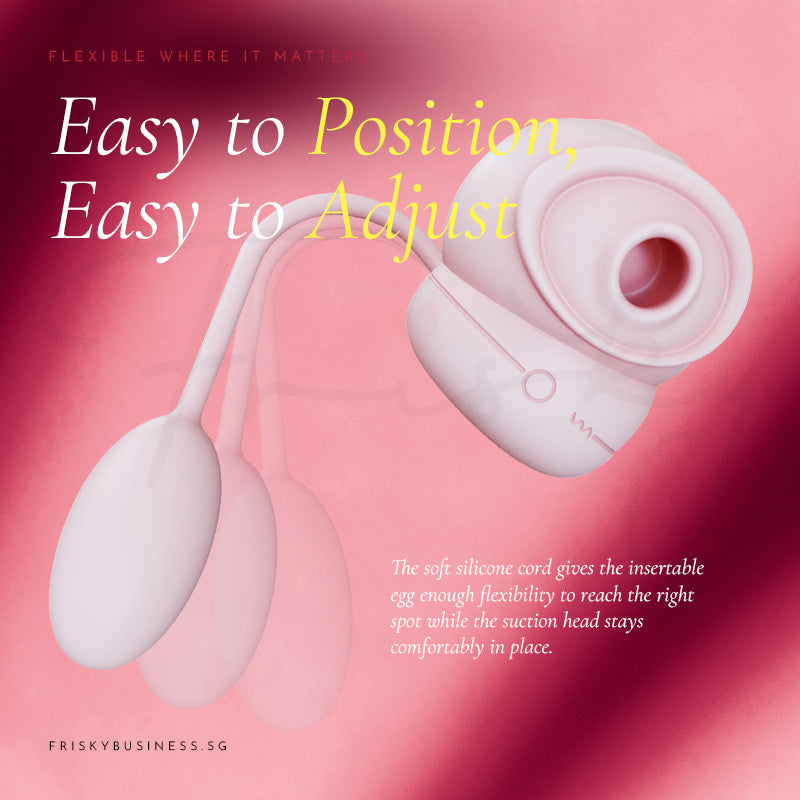 Suction stimulator beside a colourful vibration wave on a pink background