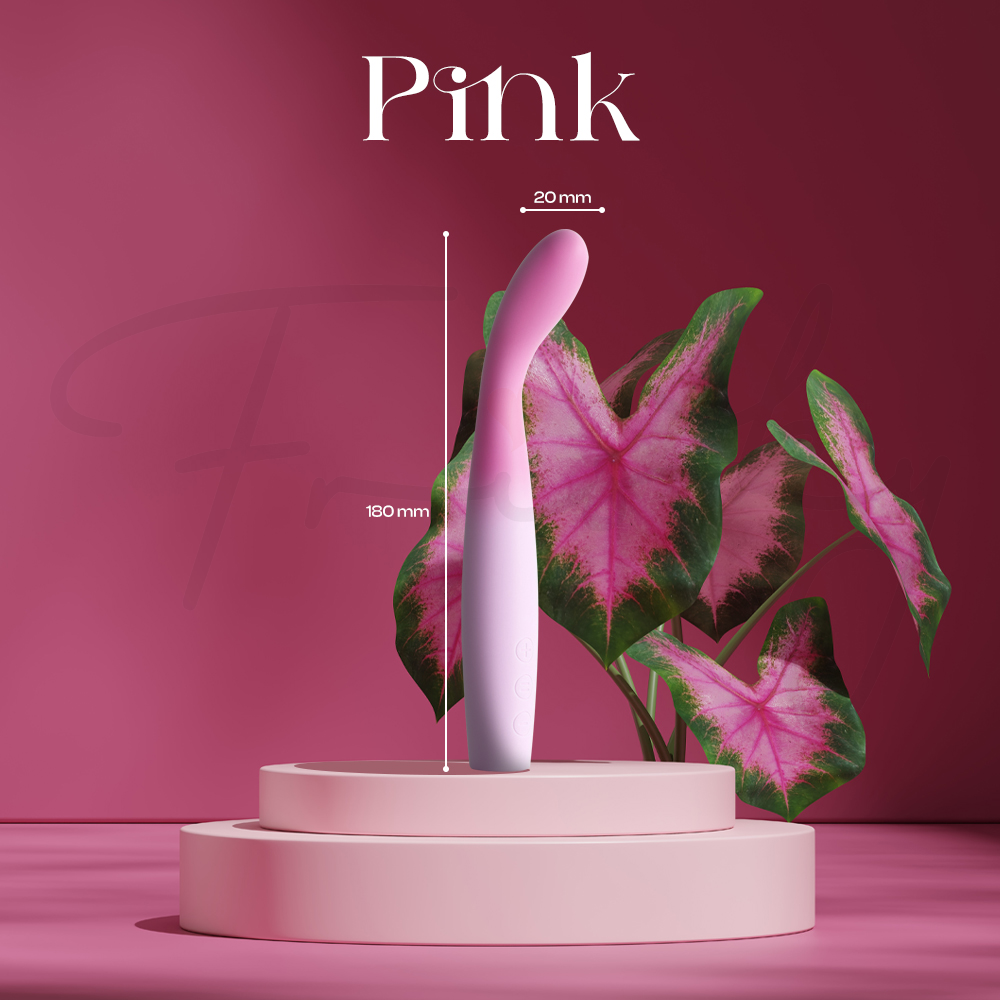 A single pink Power Bloom vibrator standing on a display pedestal next to a pink caladium plant.