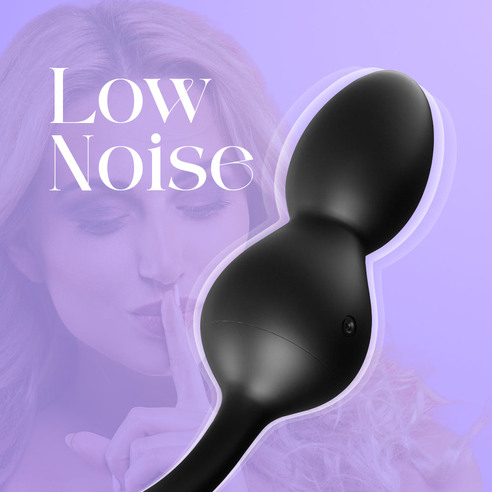 Close-up of black anal beads emphasizing quiet motor design and smooth silicone surface