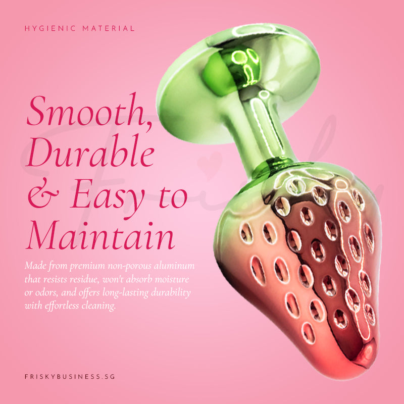 Strawberry-shaped metal plug with smooth contours and an easy-to-handle decorative base