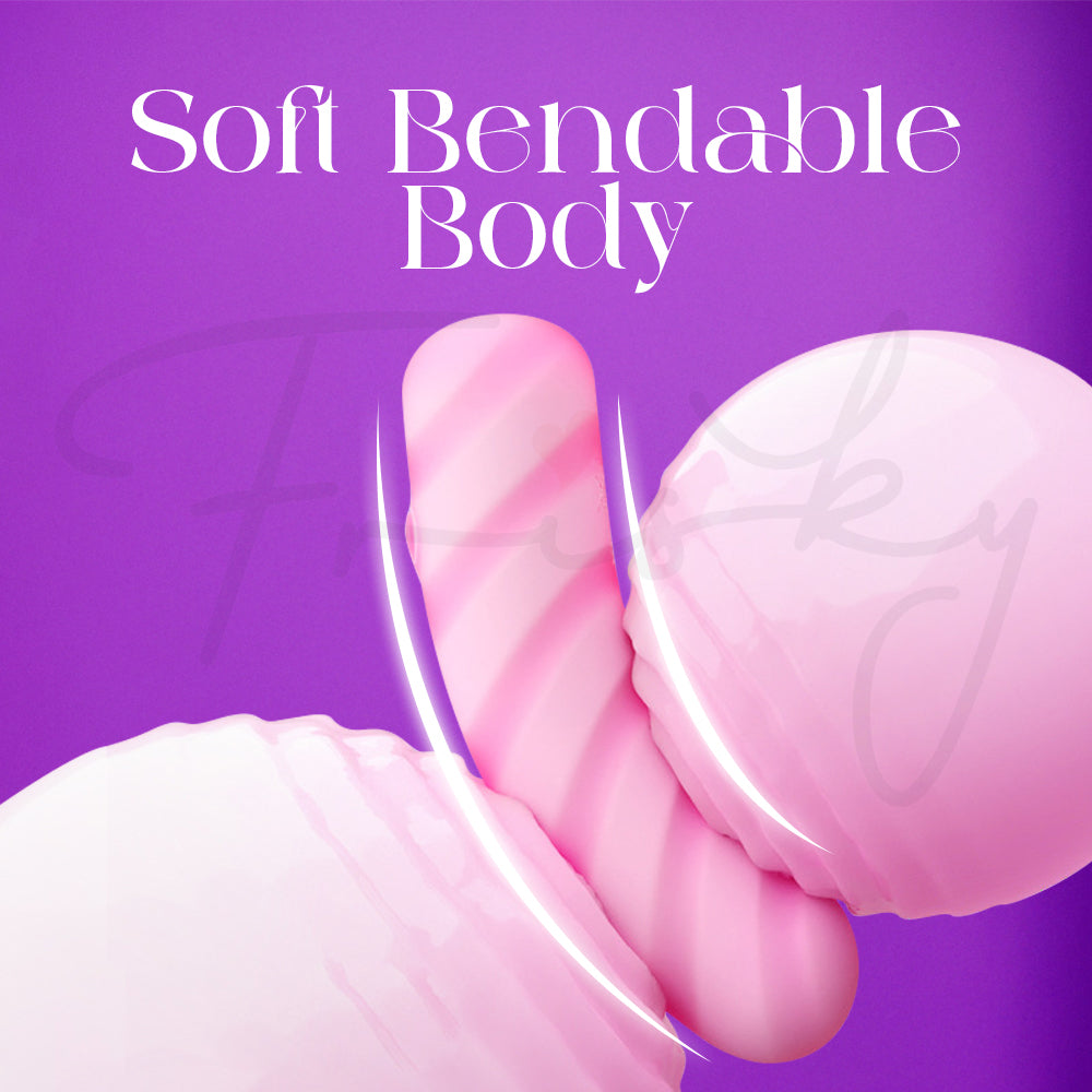 Flexible pink vibrator gently bent to show its soft, bendable silicone body