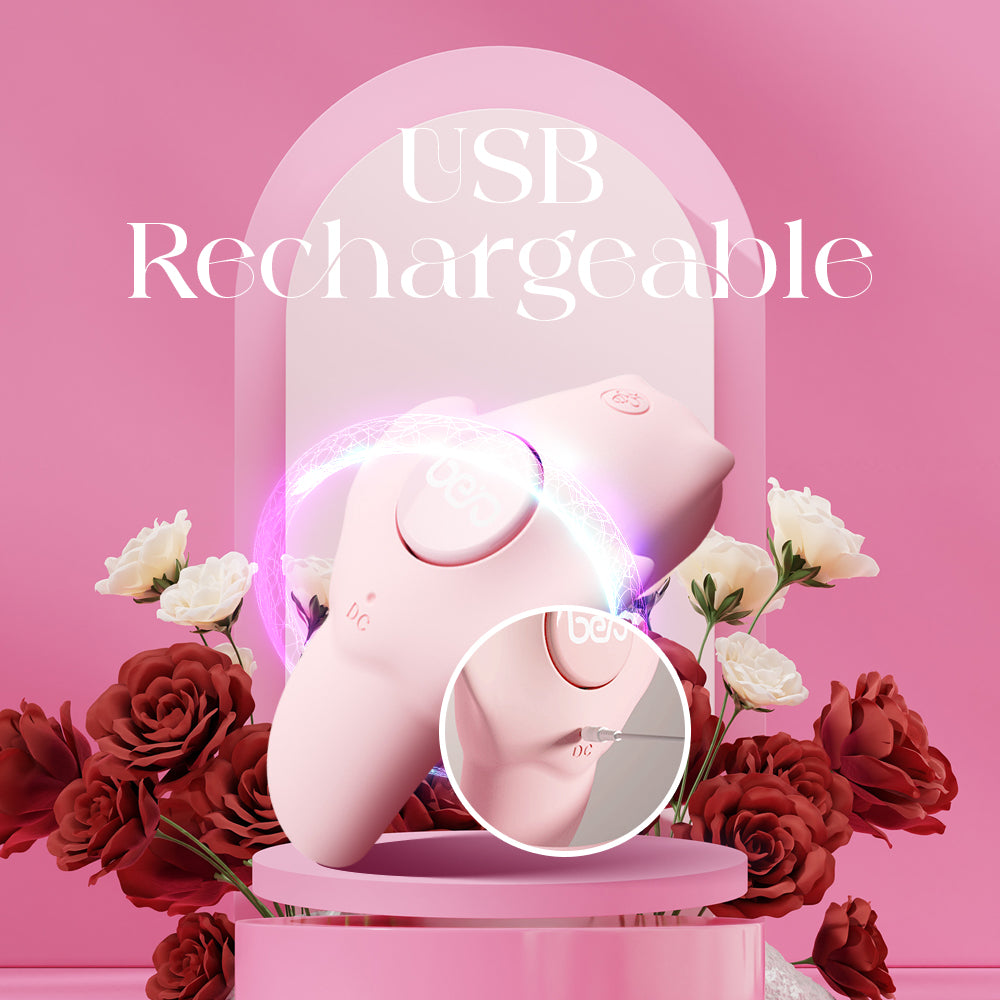 Pink vibrator displayed with flowers highlighting its USB rechargeable design.