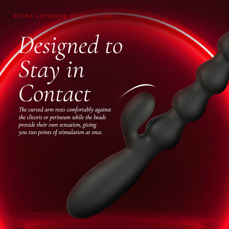 Close-up of the curved arm against a dark red background