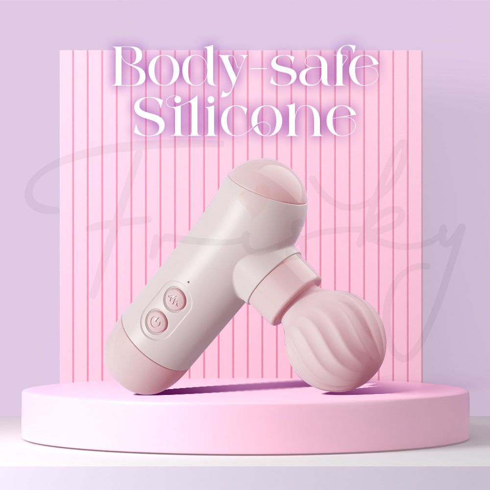Body-safe silicone dual-head vibrator shown with smooth pastel finish