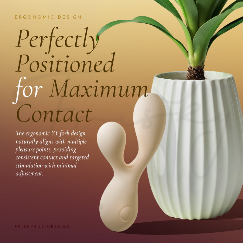 Galaku Y-shaped vibrator positioned with a decorative plant for size reference