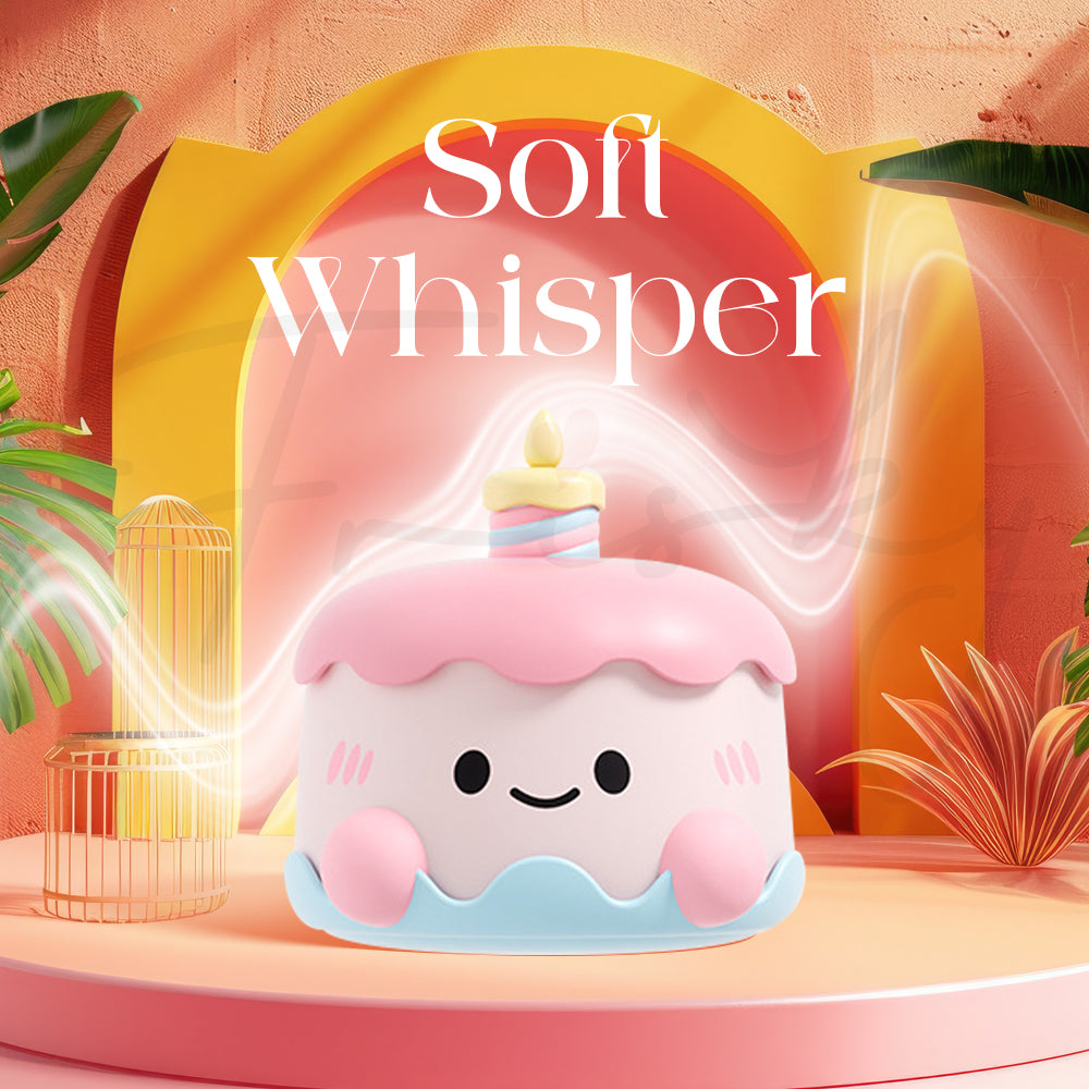 Cute cake-shaped massager highlighting quiet operation in a soft, warm setting