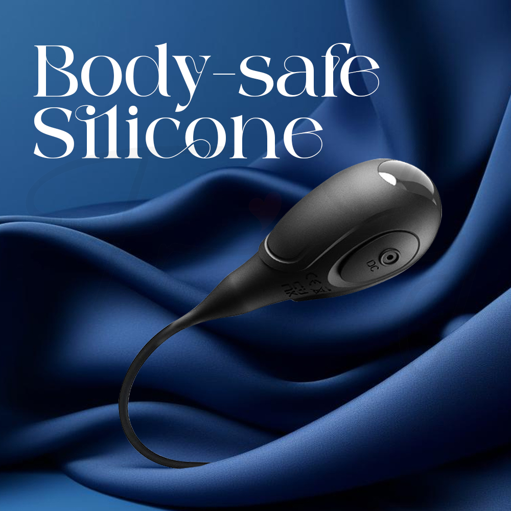 Axis One nestled on soft silicone fabric, highlighting body-safe silicone construction.
