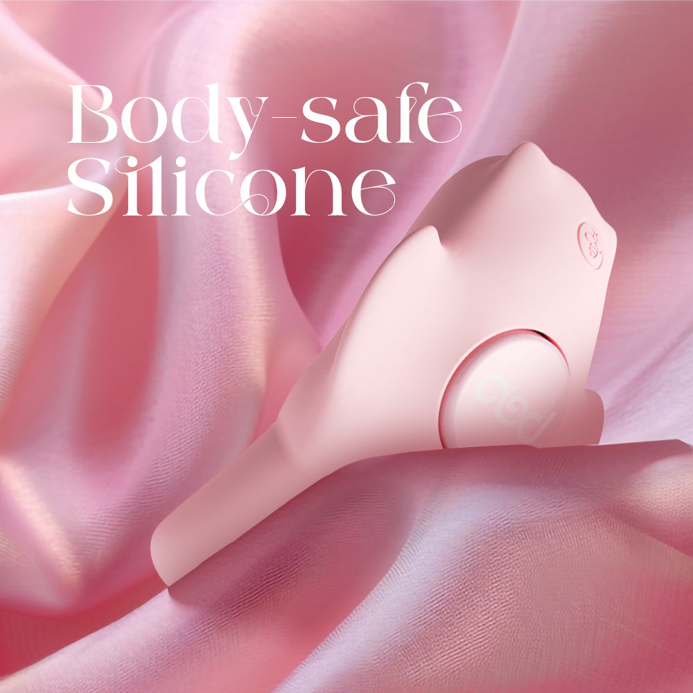 Close-up view of pink vibrator focusing on smooth body-safe silicone material.
