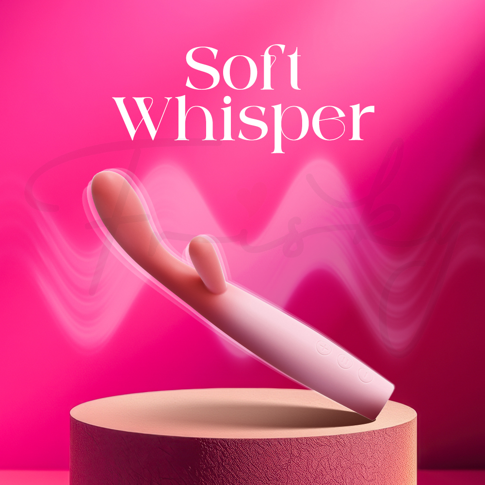 Close-up of the pink vibrator on a pedestal with the text "Soft Whisper," emphasizing low-noise operation.