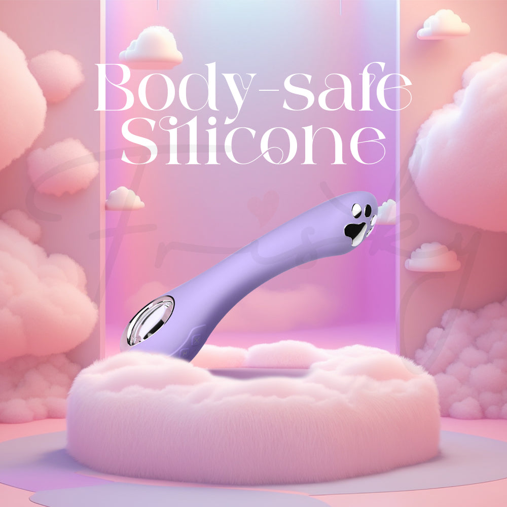 Purr Volt resting on soft fabric highlighting body-safe silicone texture.