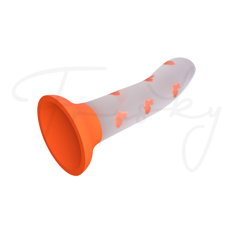 Bloom Glow toy shown horizontally with white silicone body and orange base
