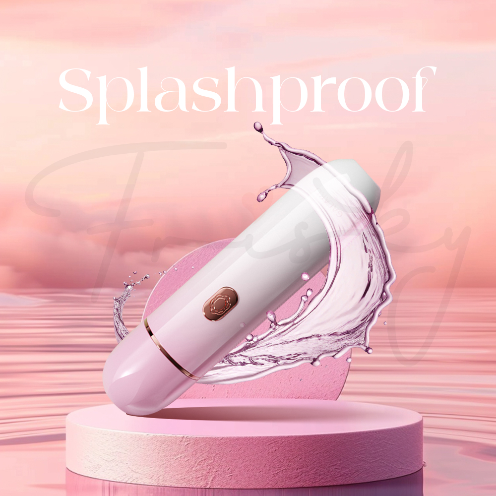 Coco vibrator partially splashed with water, showcasing its splashproof design.