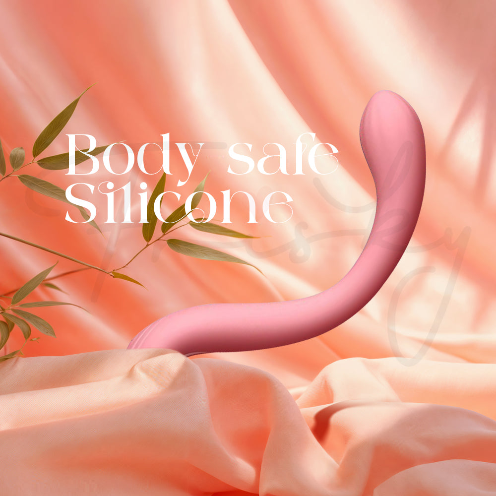 Close-up of curved vibrator surface highlighting smooth body-safe silicone texture and finish