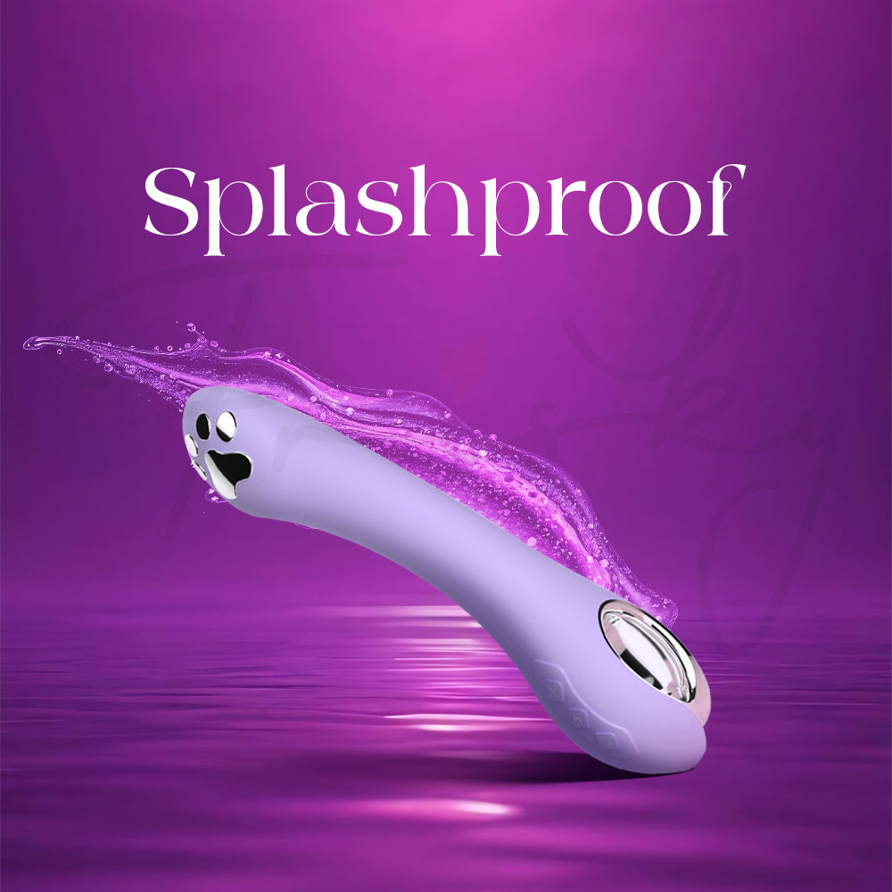 Splashproof demonstration with water droplets around Purr Volt showing wet-safe.