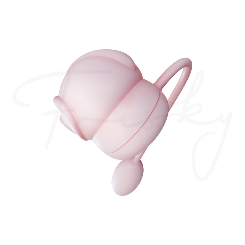 Pale pink suction stimulator shown at an angle on a plain white background