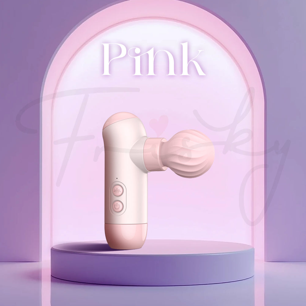 Pink dual-head massage gun inspired vibrator showcased in soft lighting