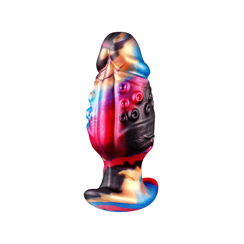 Side view of colorful tentacle-inspired silicone plug showing textured ridges and contours.