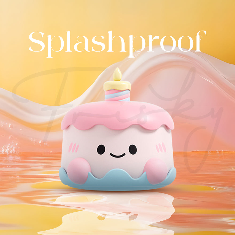 Cake-shaped device surrounded by water illustrating splashproof and easy-clean design