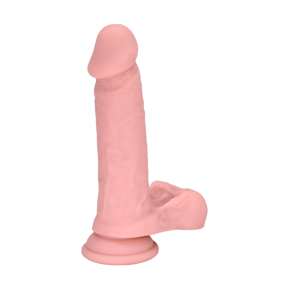 Realistic silicone dildo with lifelike head, textured shaft, and sturdy suction base