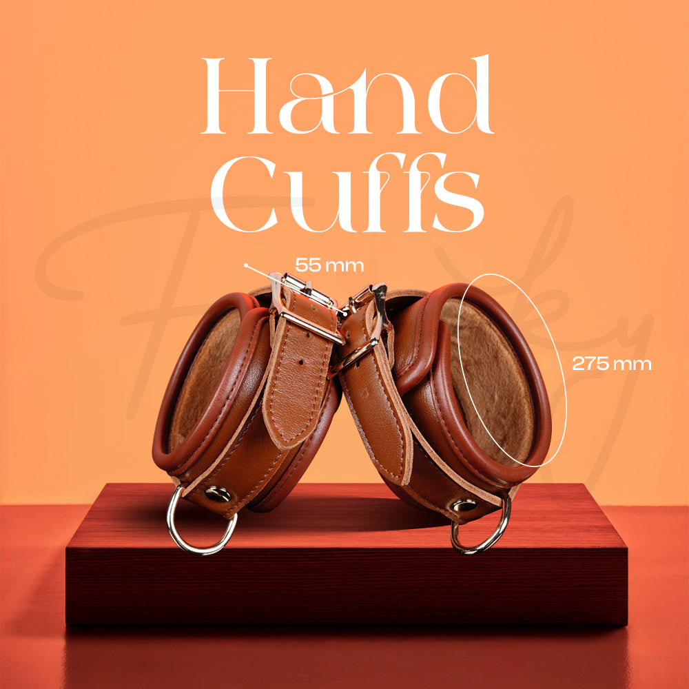 Brown adjustable wrist cuffs with secure buckles for comfortable restraint play