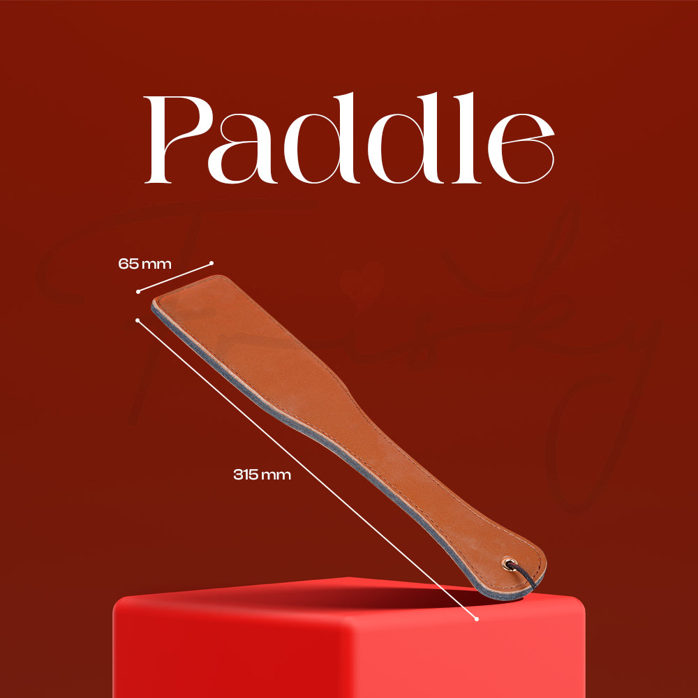 Smooth brown paddle designed for controlled impact and varied sensations