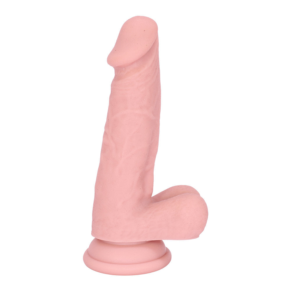 Side profile of realistic dildo showing smooth shaft, pronounced head, and stable suction base.