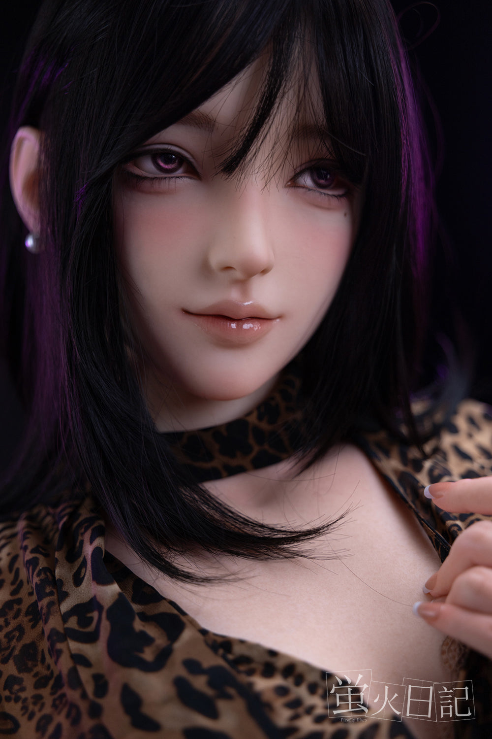Close-up of Firefly Diary Doll 161 cm Silicone – Linglong with shoulder-length black hair, soft makeup, and wearing a leopard-print top, showcasing her realistic facial details.