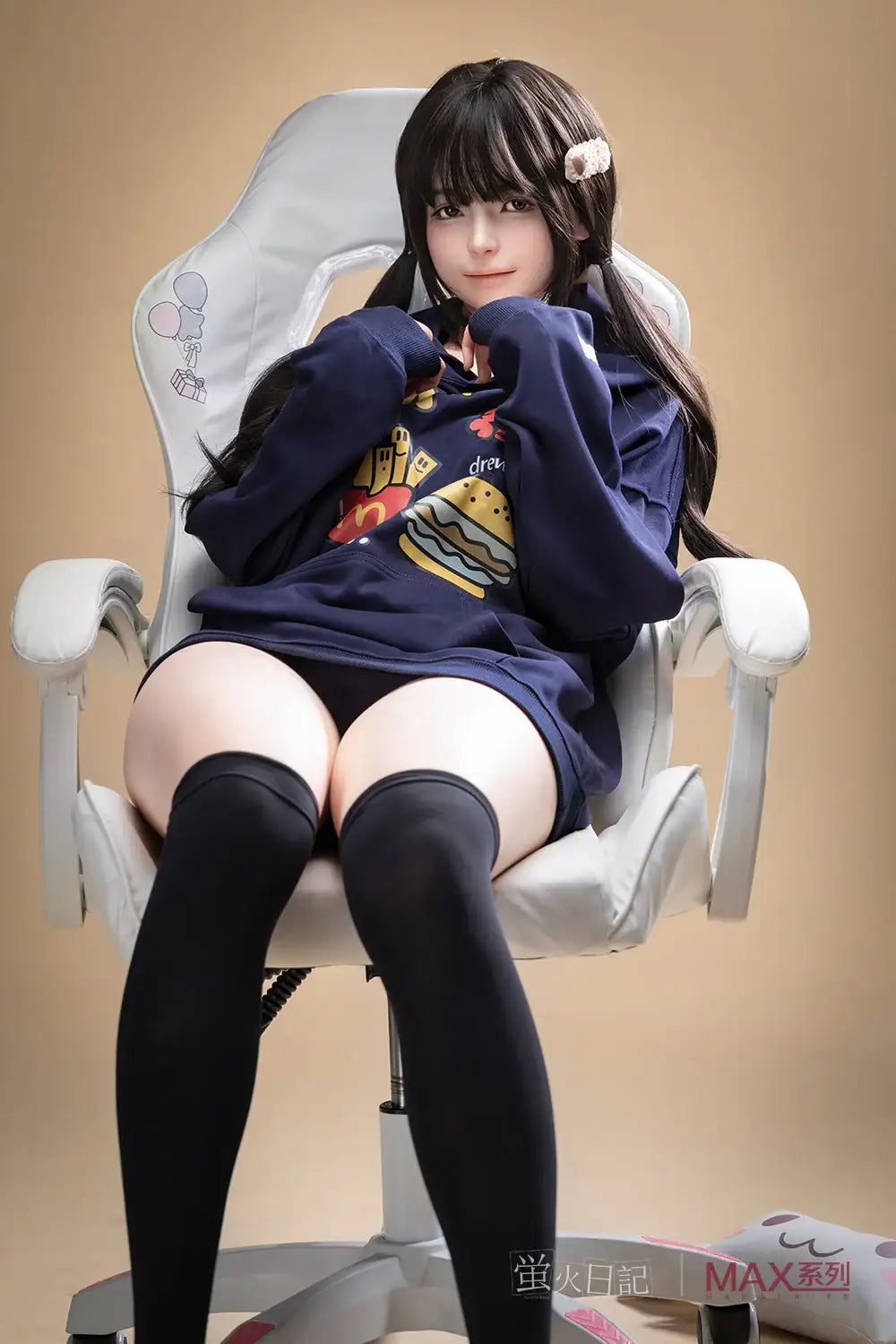 Full-body view of Firefly Diary Doll 165 cm Max Series Silicone – Qiandao seated in a chair, wearing a navy hoodie and thigh-high black socks with a neutral indoor backdrop.