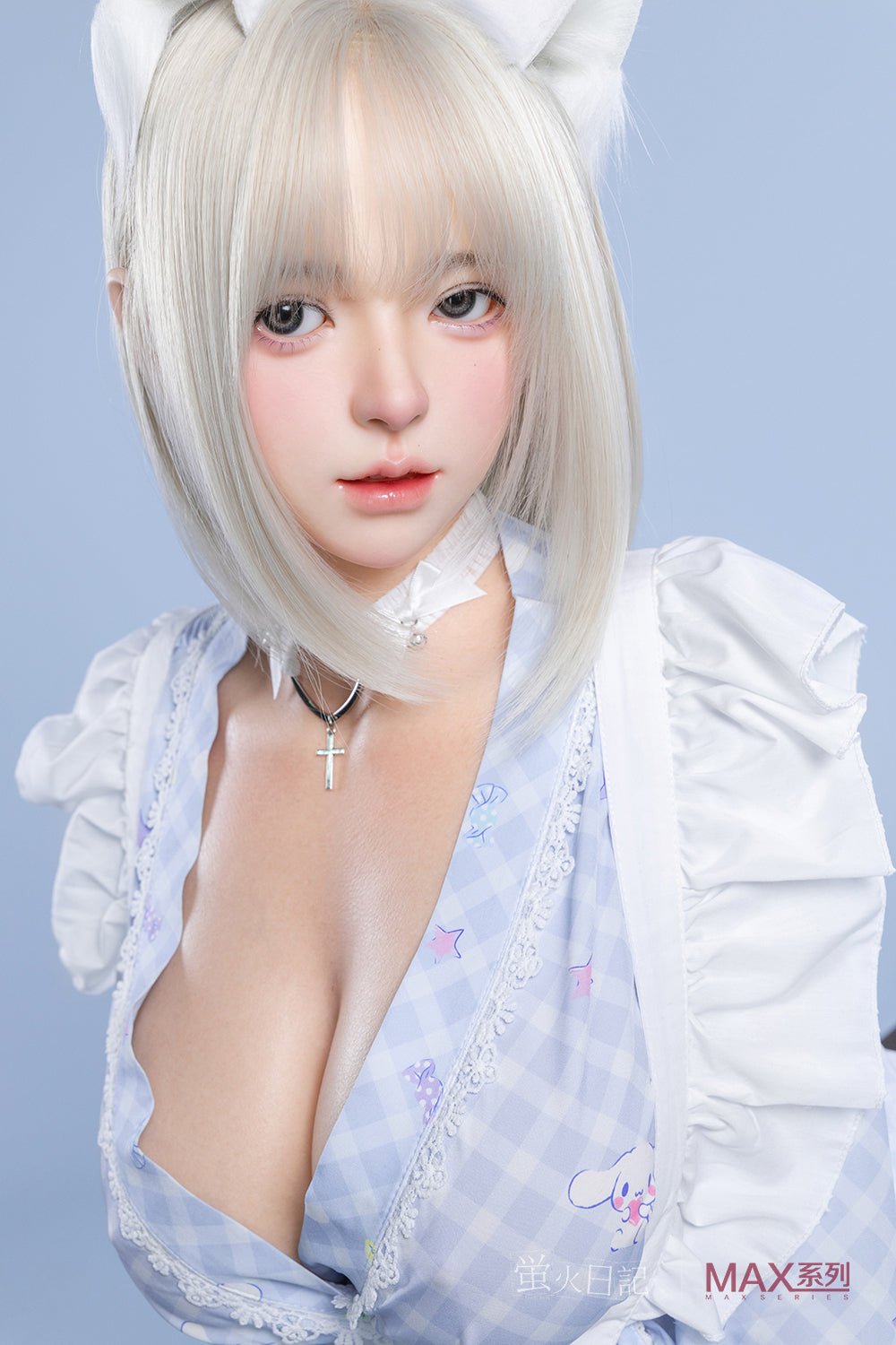 A close-up of the Lolita model featuring a soft, youthful face, platinum blonde bob with bangs, white cat ears, and a delicate silver cross necklace.