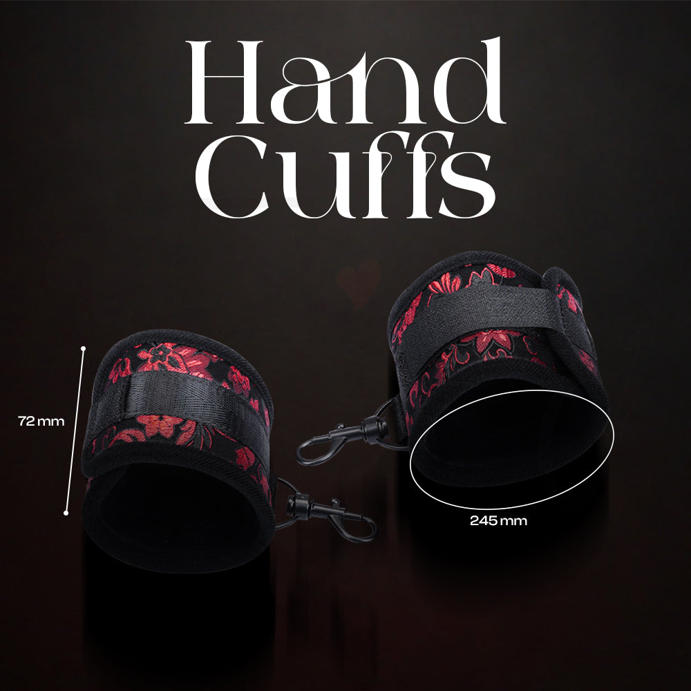 Adjustable black and red wrist cuffs with secure buckle fastening