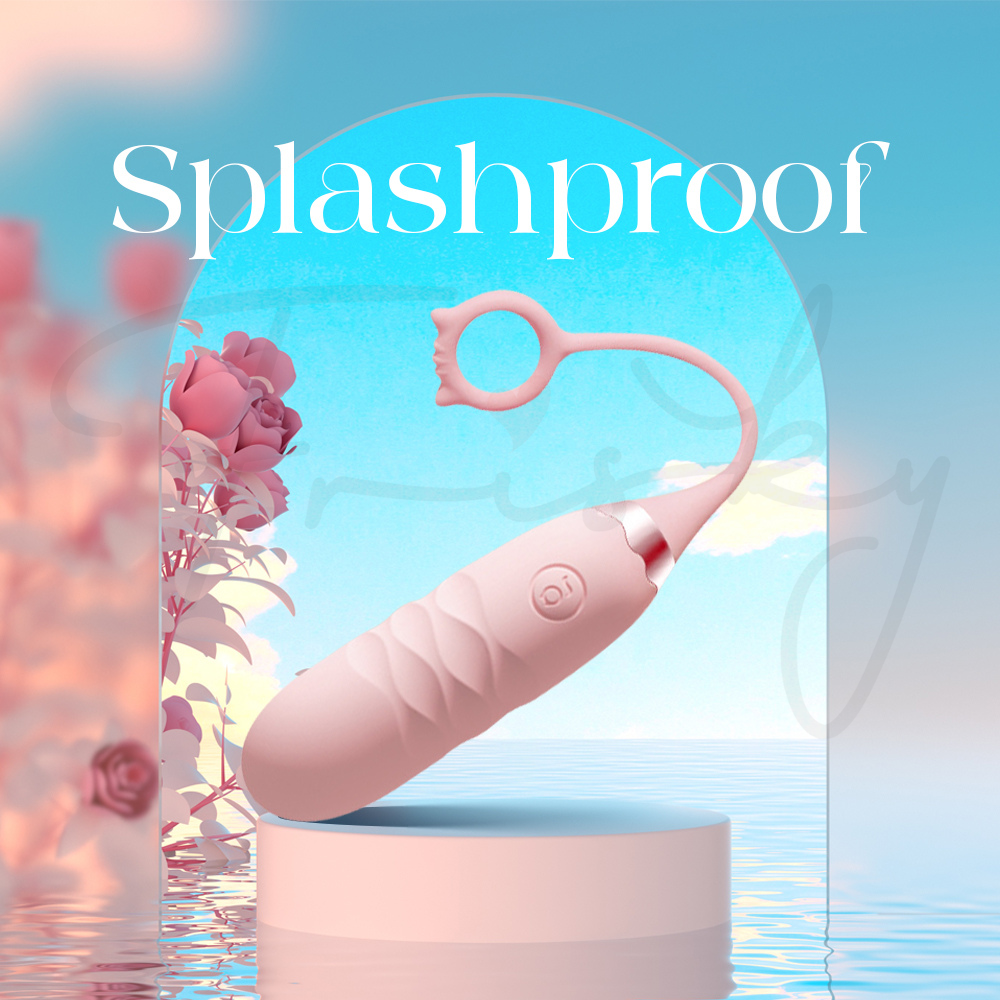 Pink Pounce being splashed with water, emphasizing its splashproof design.