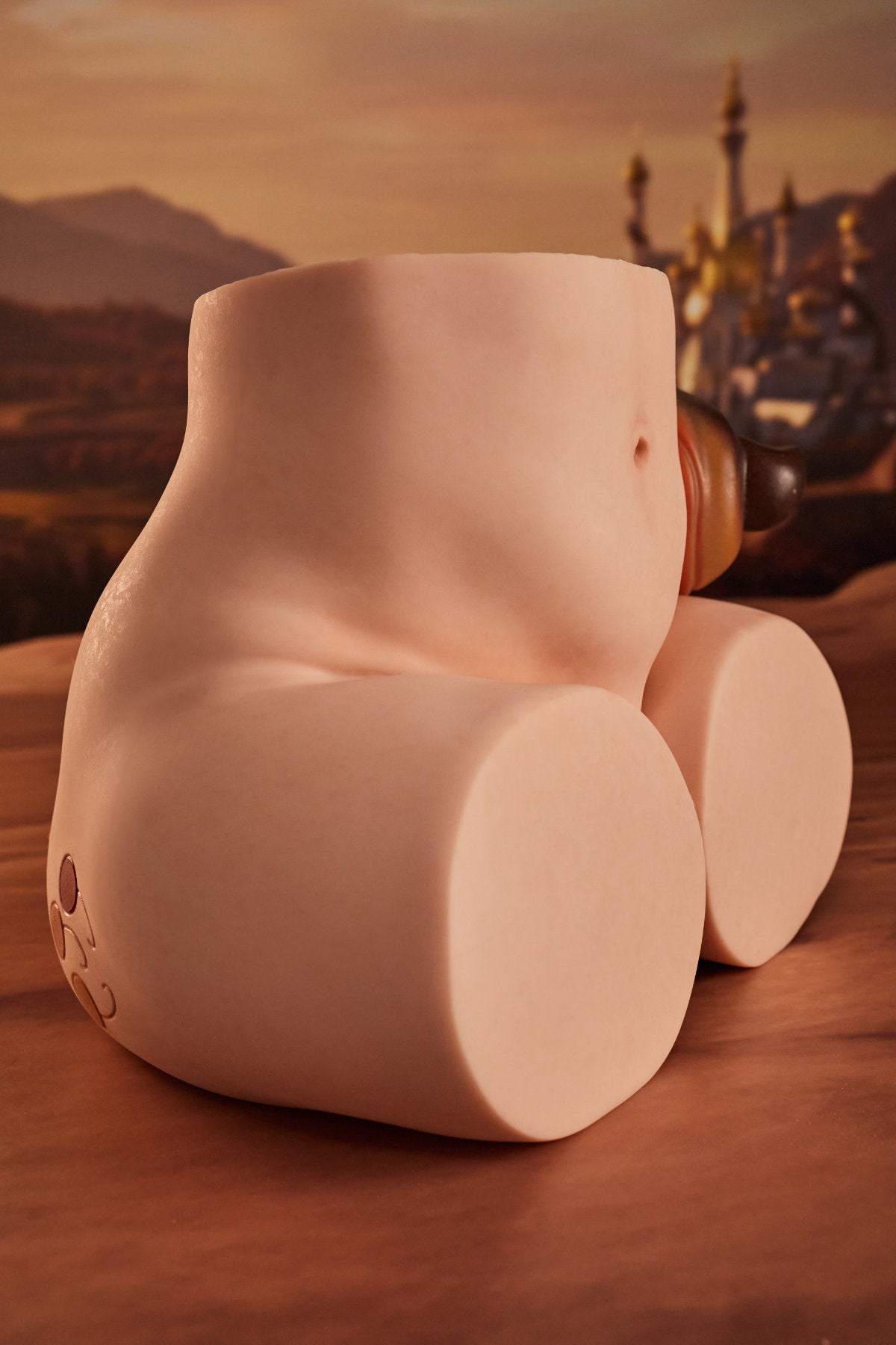 CLIMAX DOLL - PA-Peppy Silicone Butt Torso (Cinnamon) full rear view showing buttocks and back torso, desert ruins background
