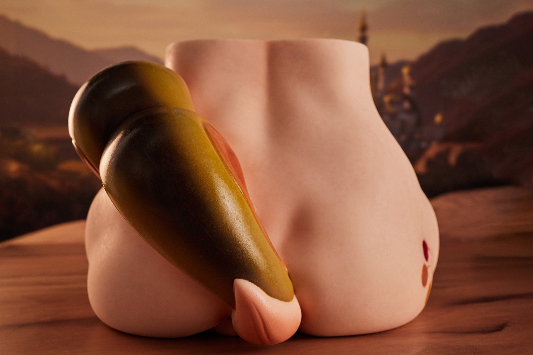 CLIMAX DOLL - PA-Peppy Silicone Butt Torso (Cinnamon) close-up rear view showing buttocks with yellow horn accessory, desert ruins background

