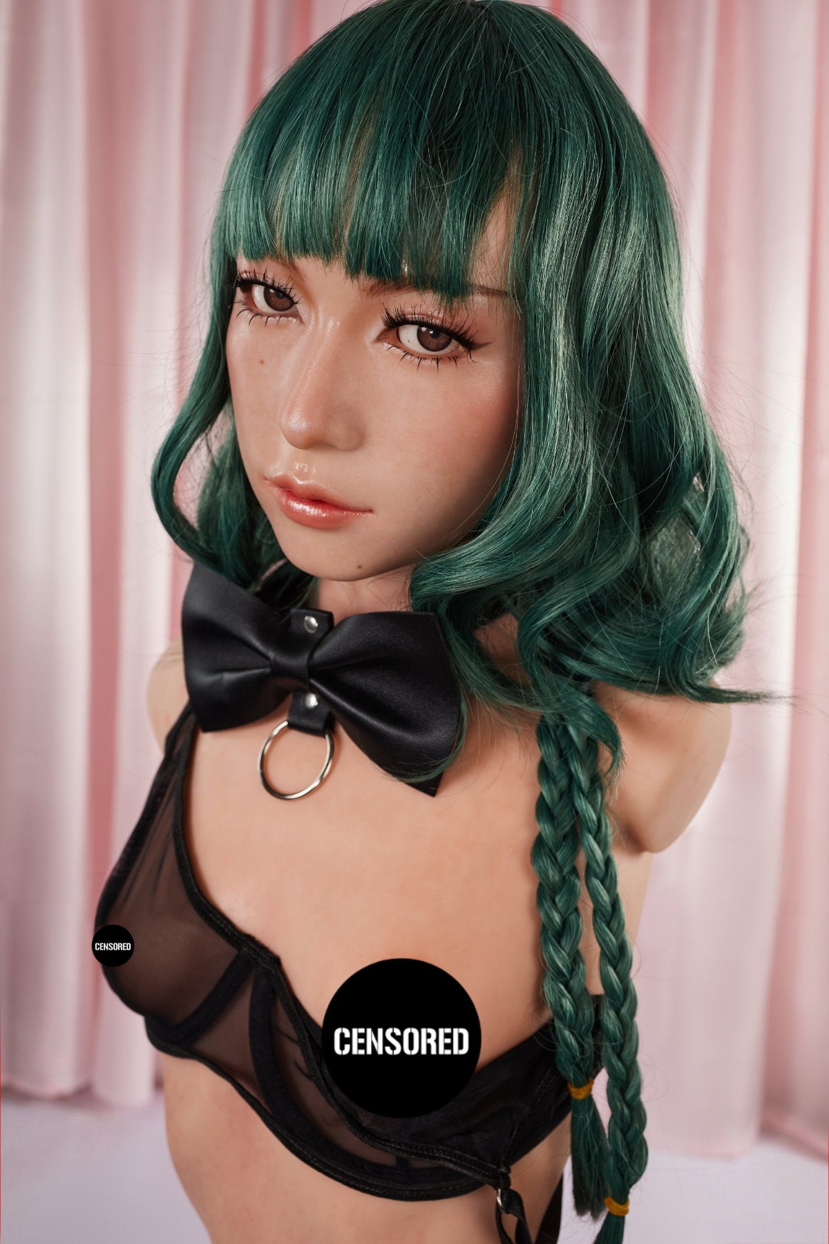 A close-up front view of the CLIMAX DOLL - ULW 881# Silicone Torso - Mayu (Natural), featuring a doll with green hair and braids, wearing a black leather bow collar and a sheer black bralette.