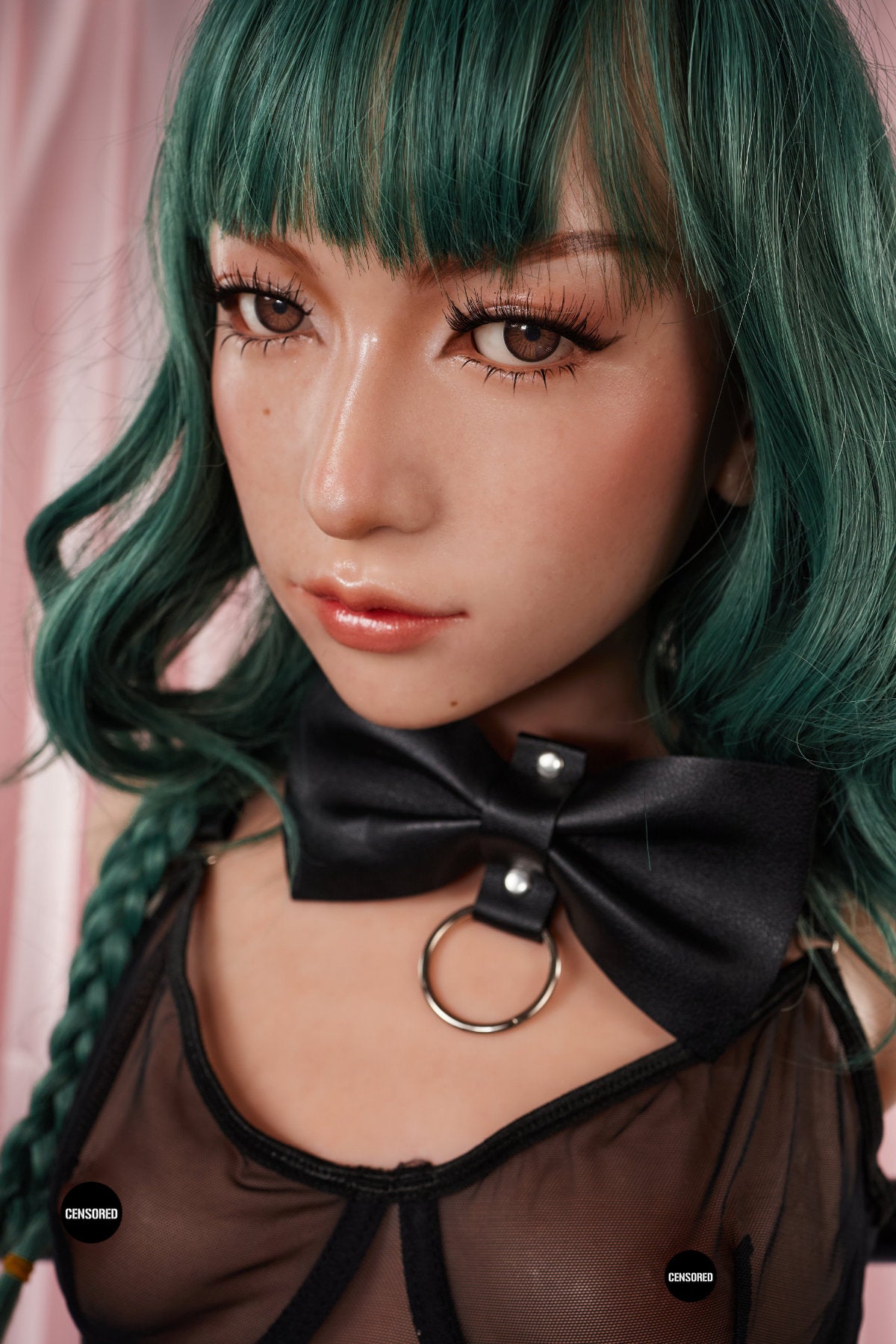 A close-up headshot of the green-haired CLIMAX DOLL - ULW 881# Silicone Torso - Mayu (Natural) detailing the facial features and the black bow collar.