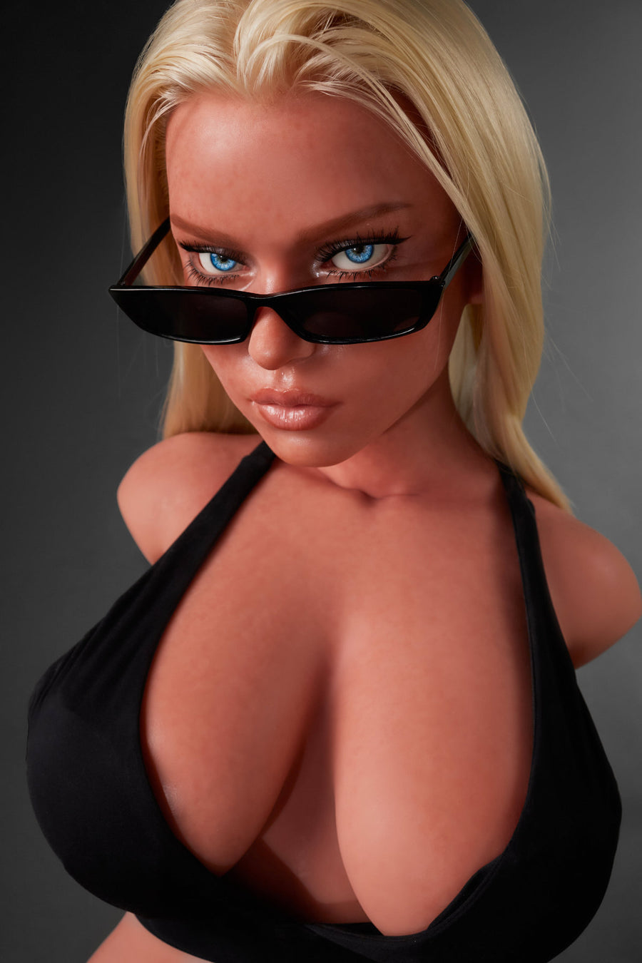 A close-up front view of the CLIMAX DOLL - ULW 883# Silicone Torso - Fiora (Black), featuring a blonde doll wearing black sunglasses and a low-cut black halter top.