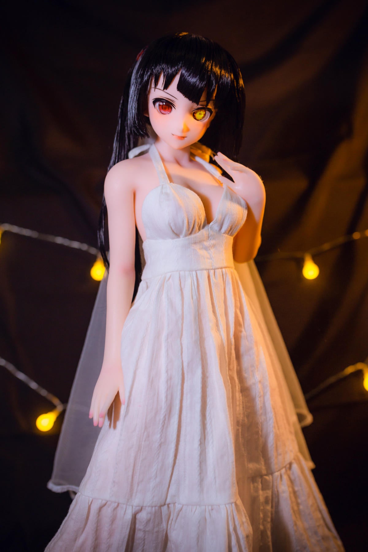 CLIMAX DOLL Mini J60 cm Hybrid - Kurumi (Cinnamon) - Full-body standing pose in a flowing white chiffon gown and veil, long black hair, glowing yellow fairy lights behind her.