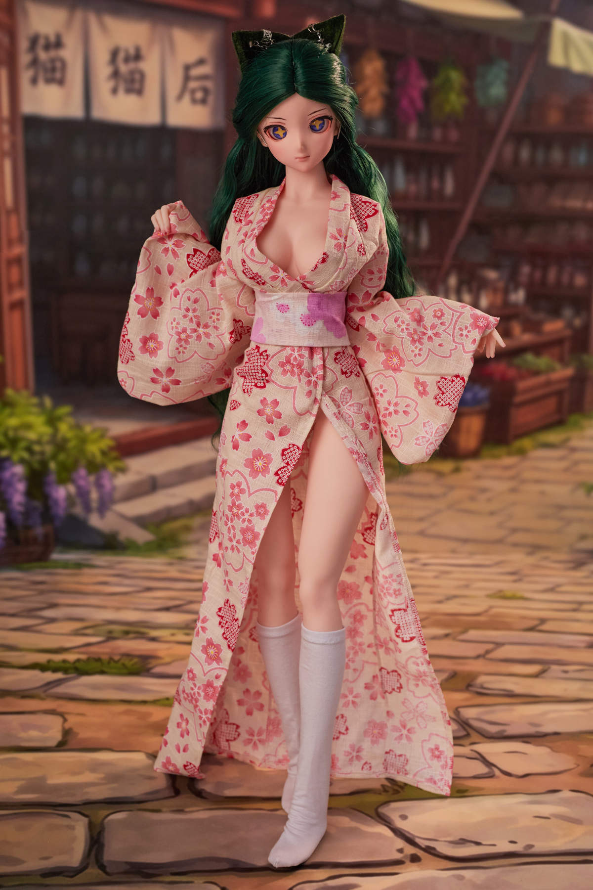 CLIMAX DOLL Mini J60cm Hybrid - Momo (Cinnamon) standing full-body in a pink floral kimono, brick wall backdrop