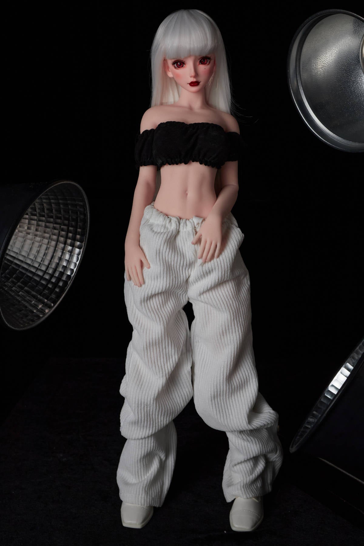 CLIMAX DOLL Mini J60 cm Hybrid - Saki (Cinnamon) – relaxed full-length pose against a dark studio backdrop