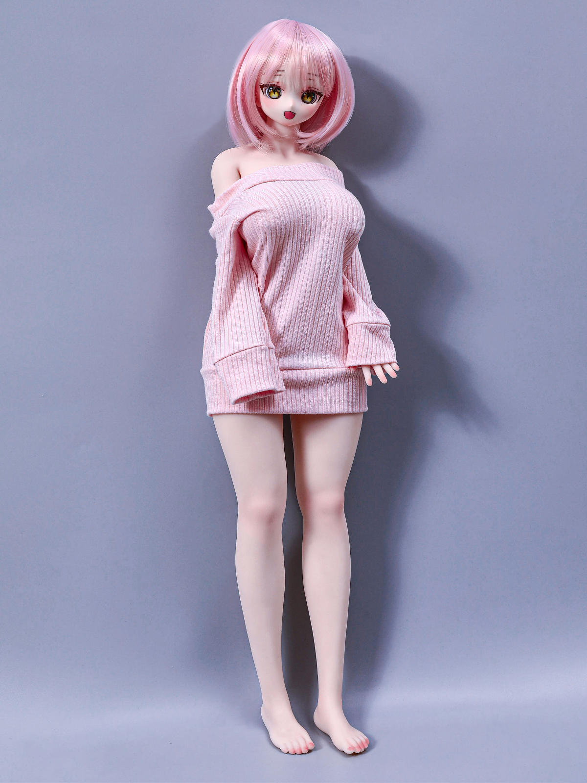 CLIMAX DOLL Mini J60cm P Hybrid - Azami (Cinnamon) full-body standing pose with legs together, pale pink sweater dress, soft studio backdrop