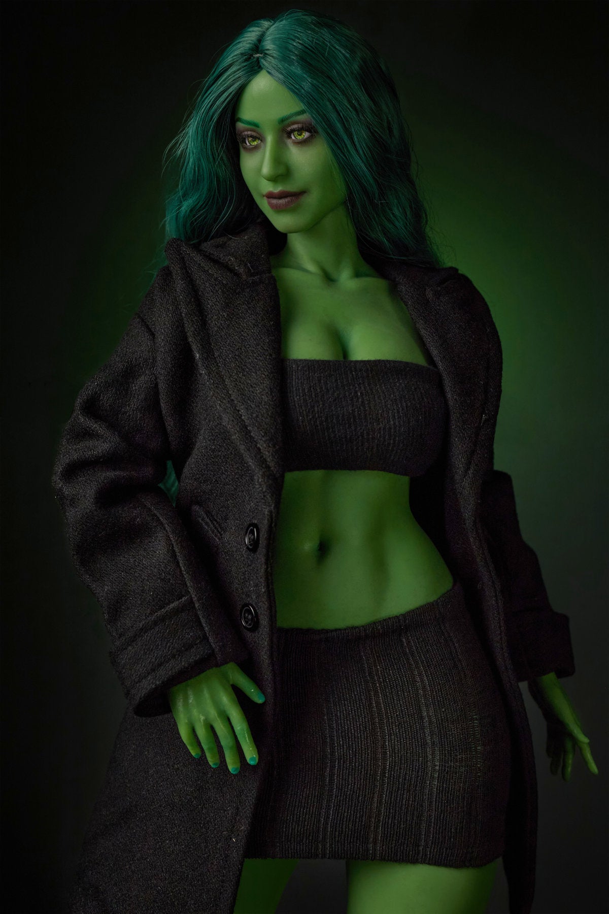CLIMAX DOLL Mini Si70cm KA Silicone - Renee (Green) full body front view in black crop top and mini skirt, long green hair, dark green studio background