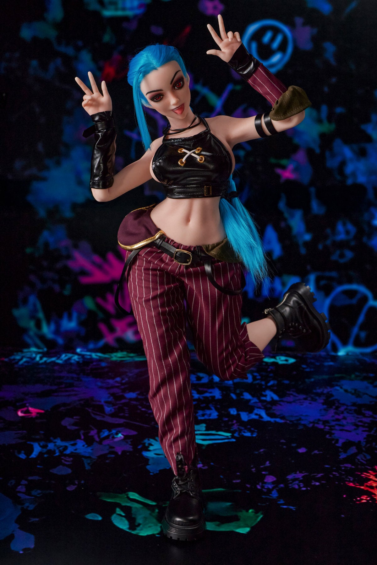 CLIMAX DOLL Mini Si70cm MO Silicone - Jetta (Cinnamon) full body standing pose in black crop top and red plaid pants, blue hair, dark bokeh background
