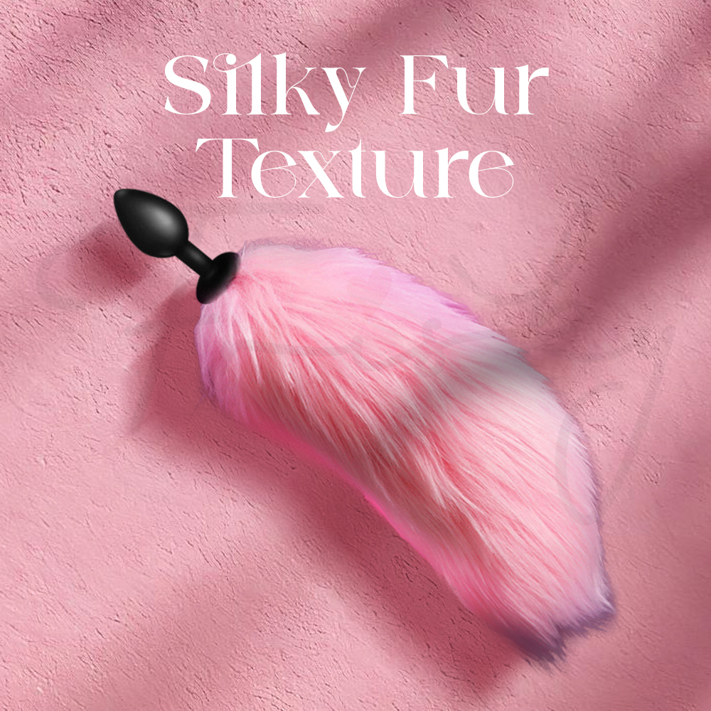 Soft pink faux fur tail texture close-up showing smooth silky finish