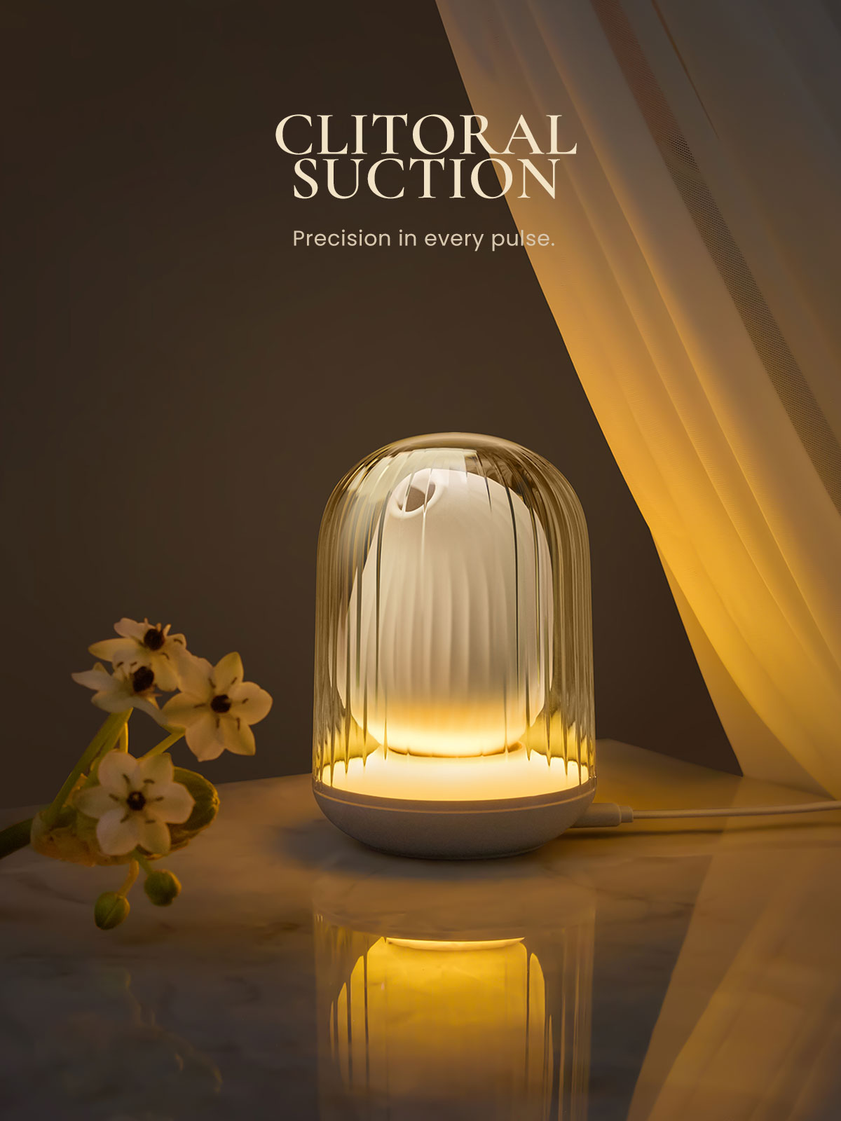 Osuga Suction Vibrator with decorative night light with flowers on a reflective surface, dark background