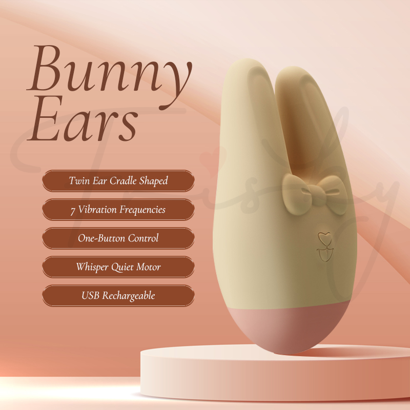 Bunny Ears Nuzzle displayed on a pedestal against a soft pink and tan gradient background