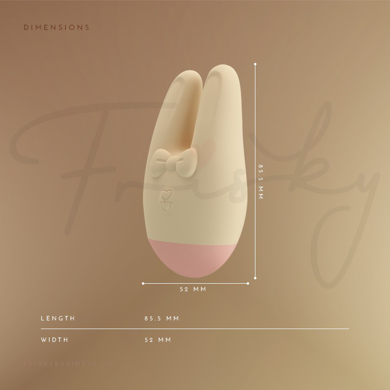 Bunny ear nuzzle vibrator shown against a warm tan background