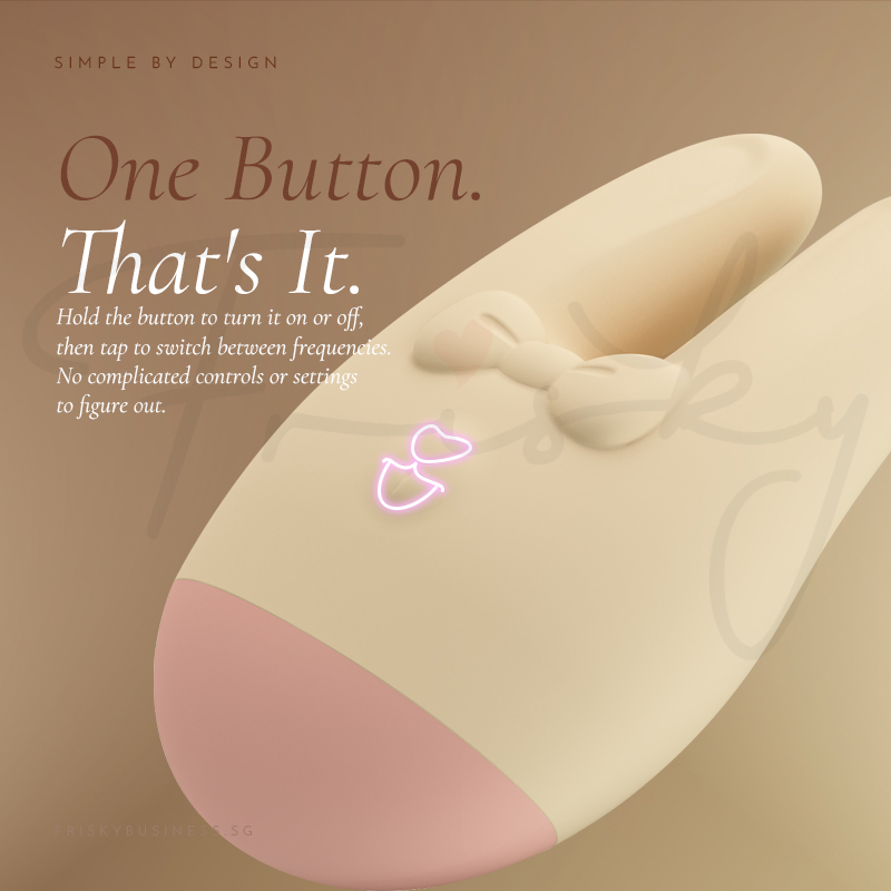 Close-up of the single control button on the vibrator's base